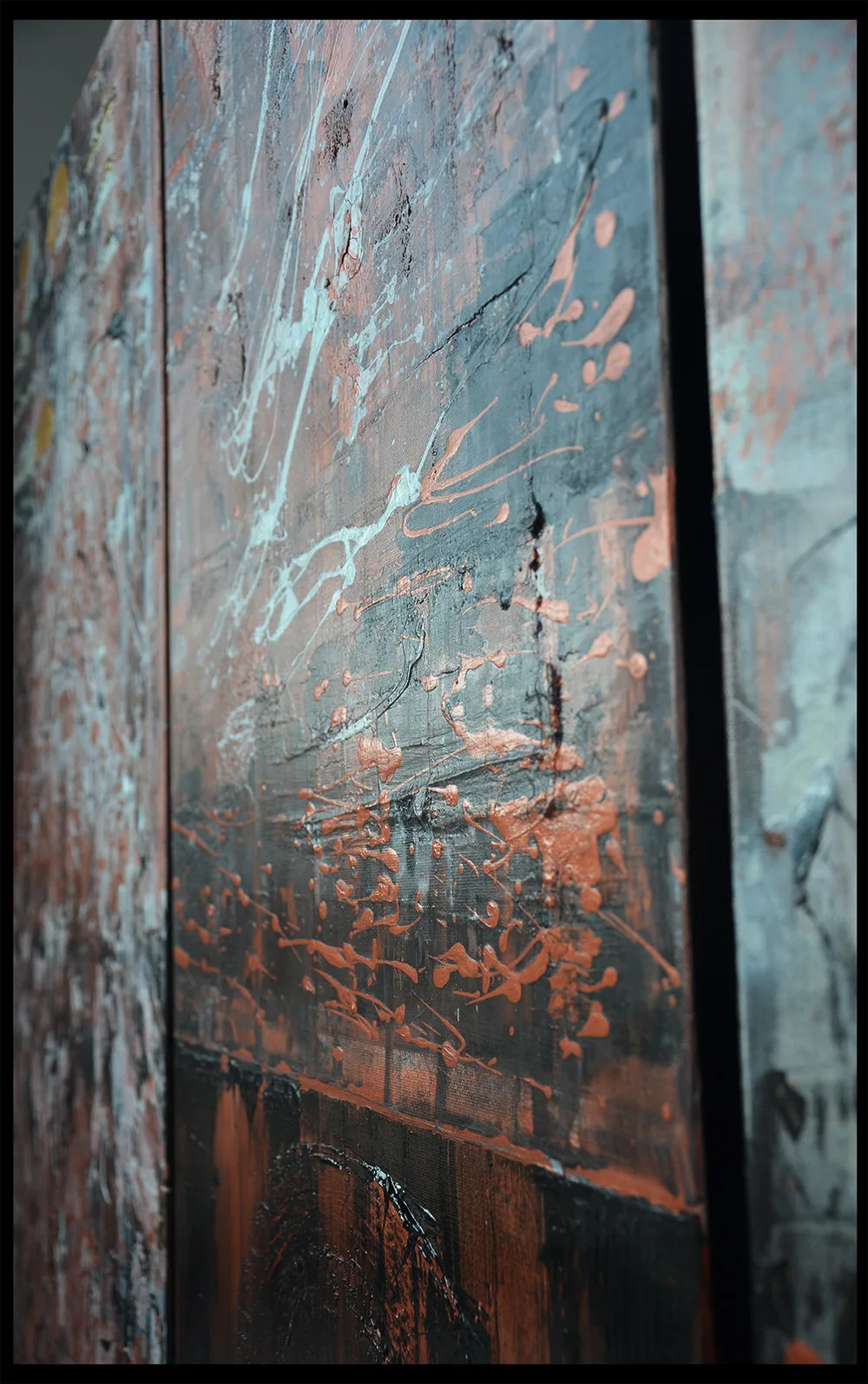 details of Benie's abstract painting Dancing coppers triptych black and copper painting